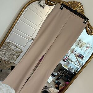 NWOT H&M size medium. Tan flair dress pants. Stretchy.